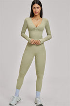 Fitglutes Activewear long sleeve crop top from The Swoon collection, shown in black with fitted design and crew neckline.