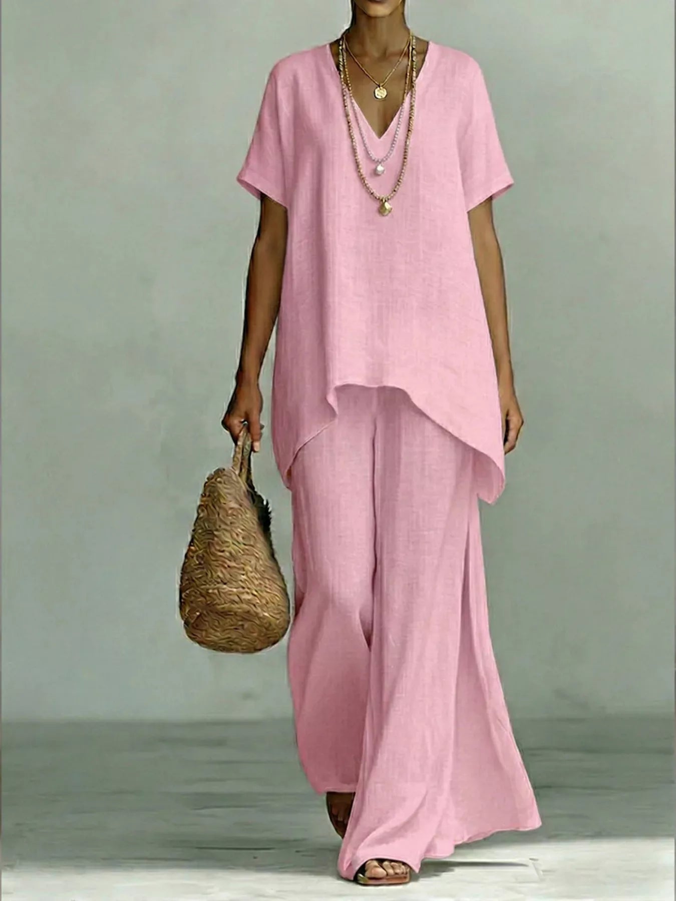 Plus size V-neck top and wide-leg pants set by Shopimist, featuring a comfortable, stylish two-piece outfit in a full size fit.