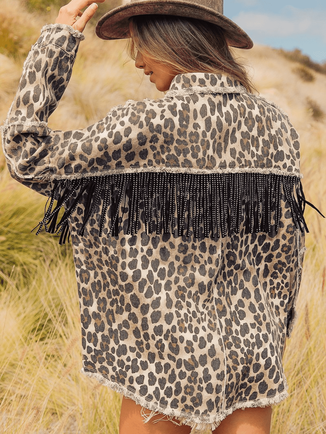 Leopard fringe detail denim jacket with collared neck from Plush Fashion Hub, casual fashion clothing for women.