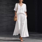 Women's casualwear V-neck button-up top and long skirt set by FitiqueFit, featuring a stylish, comfortable design.