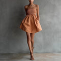 Women's strapless tube mini dress by FitiqueFit with solid color and elastic waist, perfect for casualwear.
