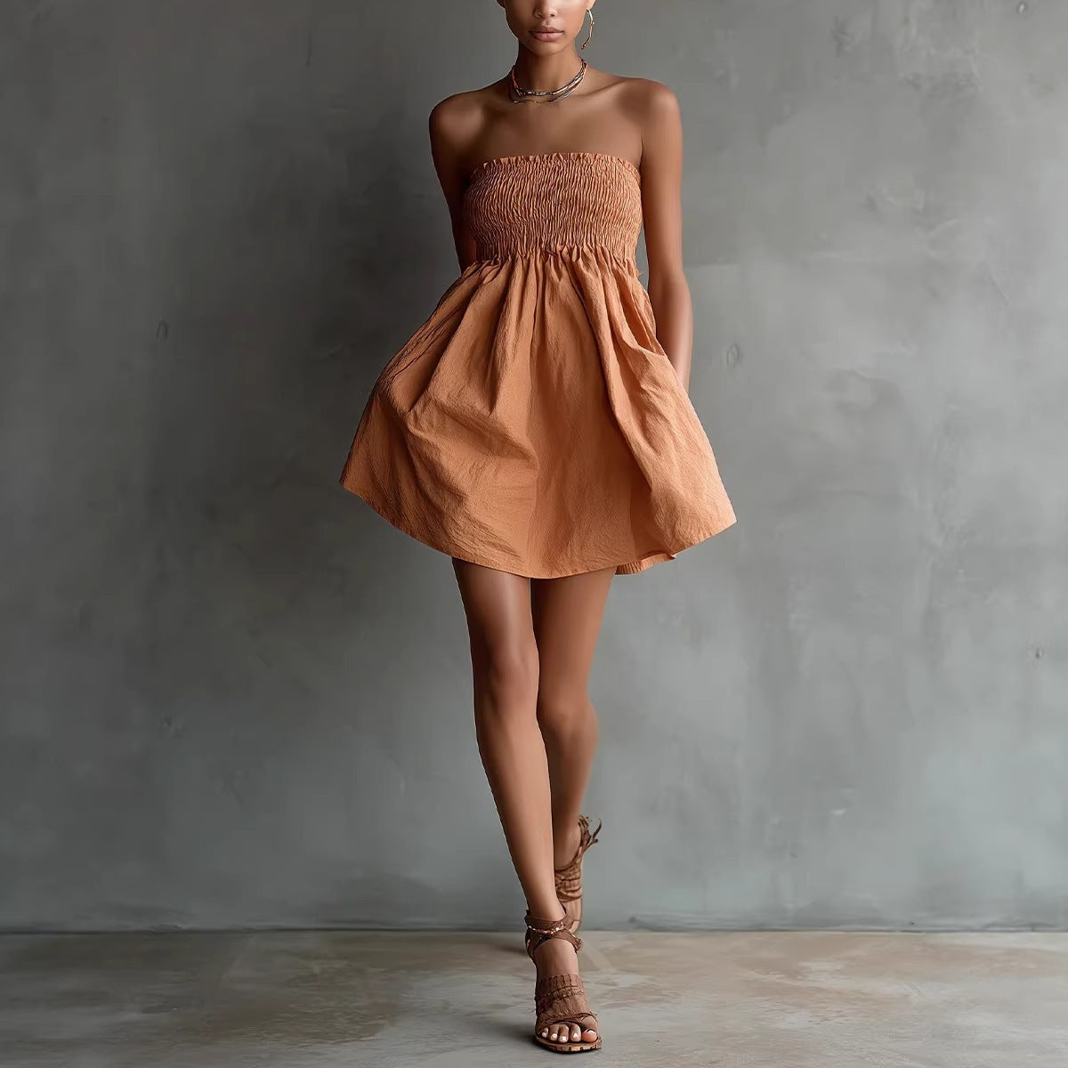 Women's strapless tube mini dress by FitiqueFit with solid color and elastic waist, perfect for casualwear.