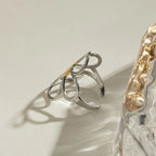 Two-tone Daisy Flower ring by Shopimist featuring a delicate floral design in gold and silver tones.