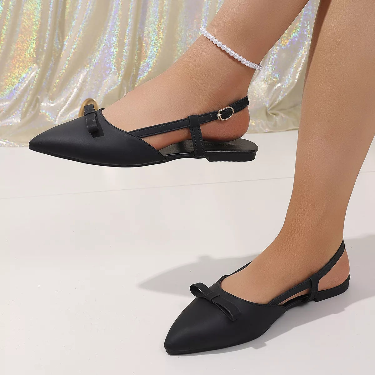 Shopimist point toe slingback sandals featuring a sleek design with a comfortable heel and stylish straps.