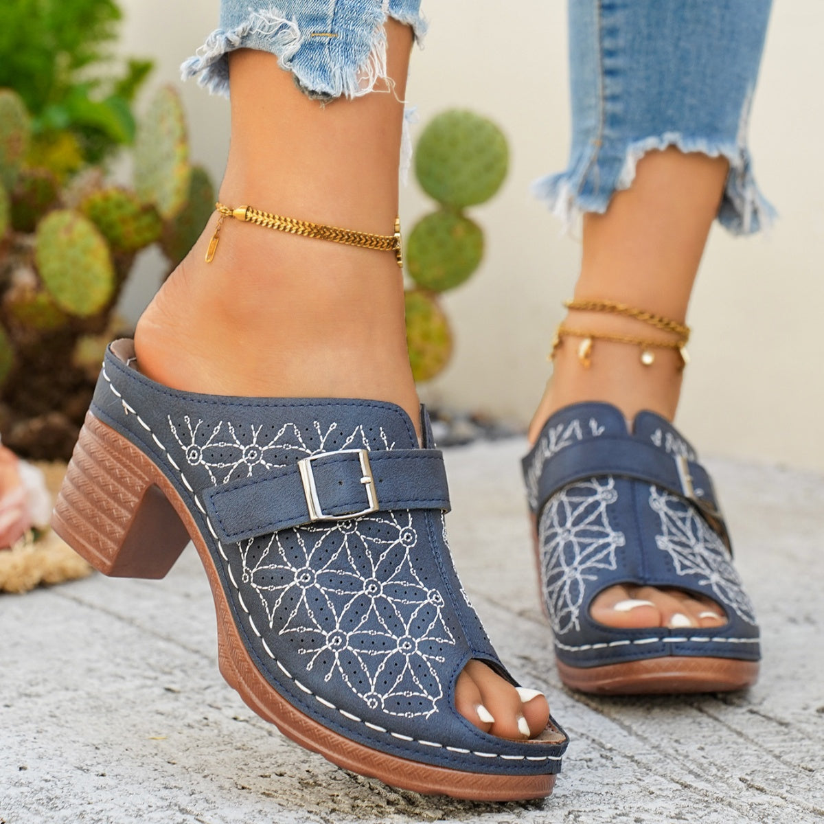 Women's chic buckle detail block heel sandals by Trendsi, made of premium faux leather, showcasing stylish design and comfortable fit.