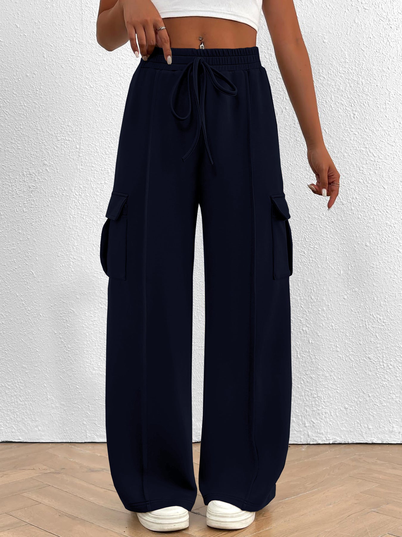 Women’s high-waisted casual cargo pants with drawstring, lightweight utility pants by Trendsi, shown in a relaxed fit style.