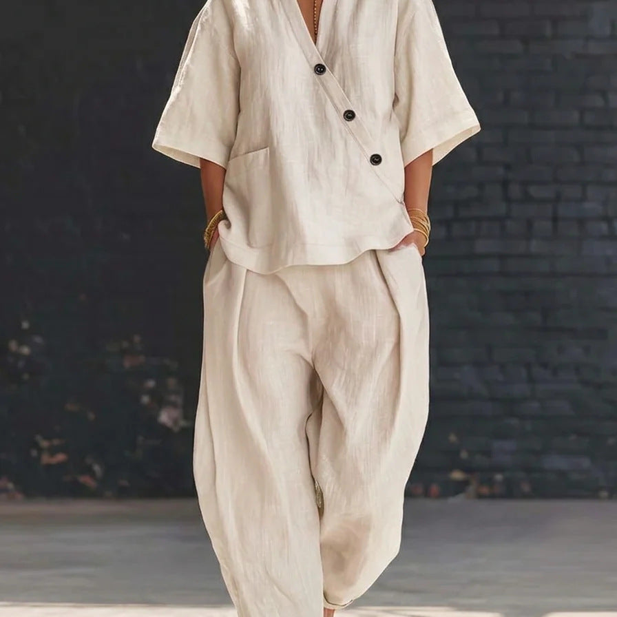 Plush Fashion Hub V-neck short sleeve top and high-waist trousers two-piece set, stylish casual outfit for women.