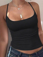 Solid color scoop neck camisole tank top by Plush Fashion Hub, featuring a smooth fabric and sleeveless design.