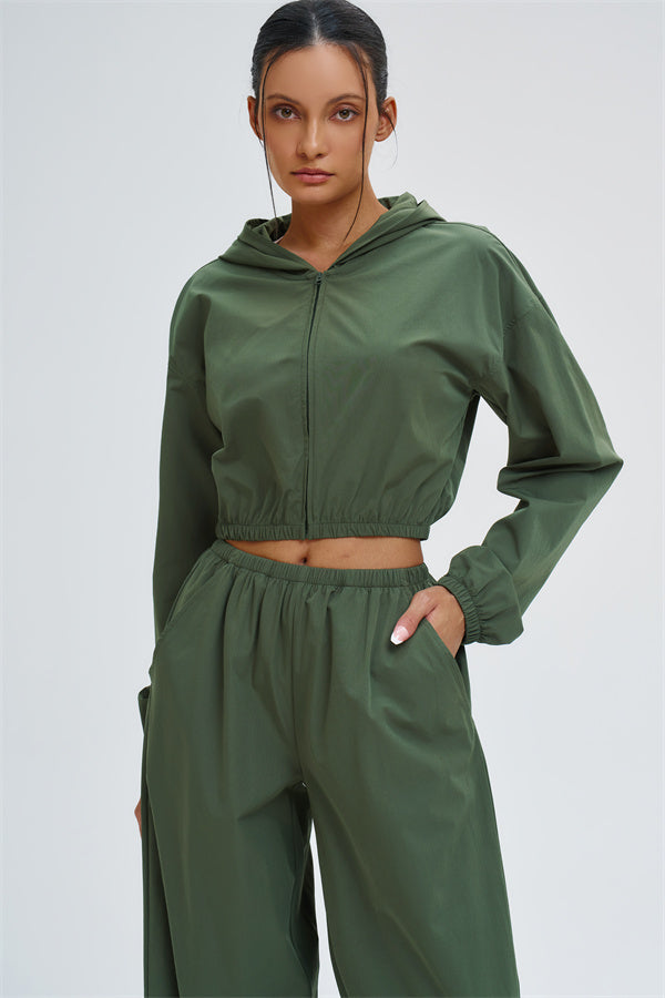 Fitglutes Activewear UV protection crop hoodie with a fitted design, perfect for gym and workout sessions.
