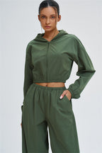Fitglutes Activewear UV protection crop hoodie with a fitted design, perfect for gym and workout sessions.