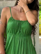Backless spaghetti strap slit maxi dress from Trendsi, elegant plus size summer formal dress with flowing fabric and stylish design.