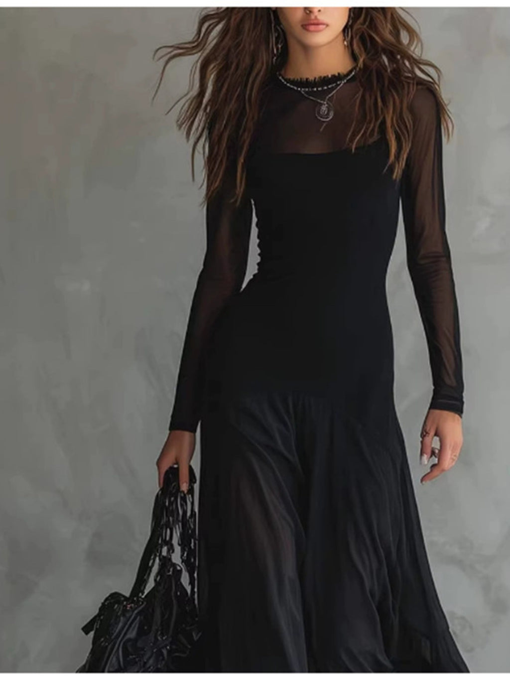 Elegant sheer mesh two-piece maxi dress set by Trendsi featuring flowy fabric and stylish design, shown on a model.