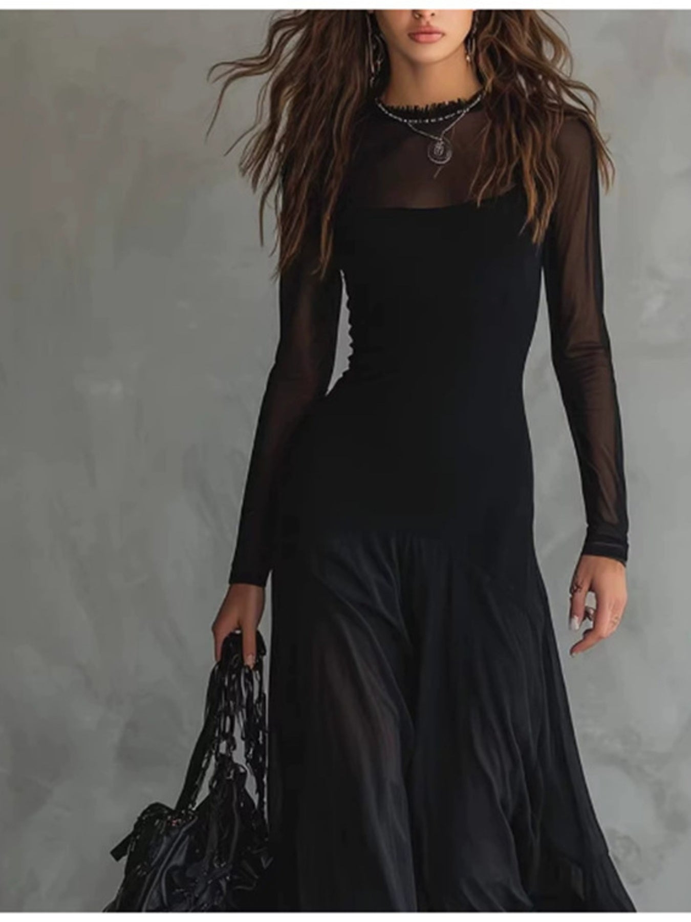 Elegant sheer mesh two-piece maxi dress set by Trendsi featuring flowy fabric and stylish design, shown on a model.