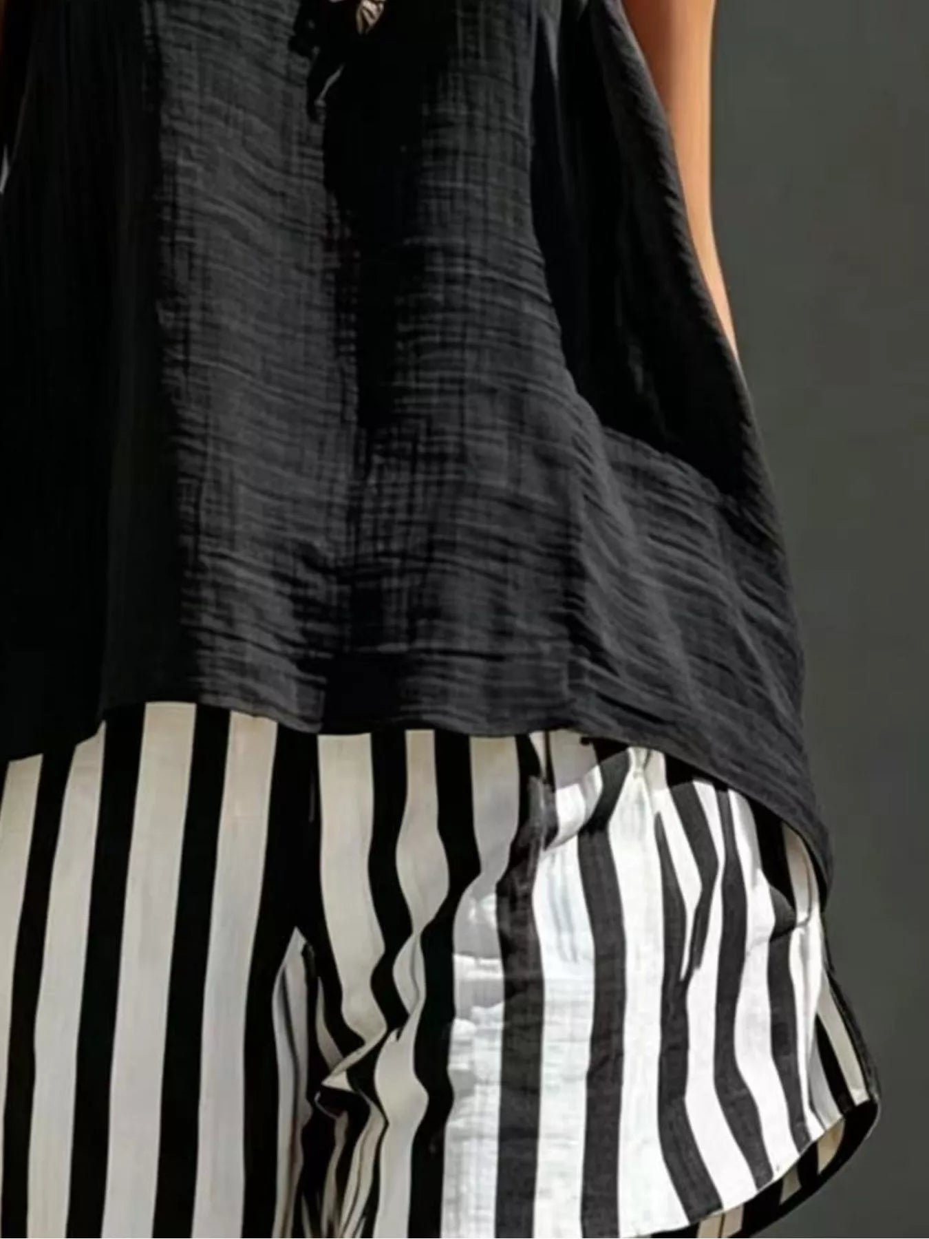 Plush Fashion Hub two-piece set featuring a round neck tank top and striped shorts, perfect for casual wear.