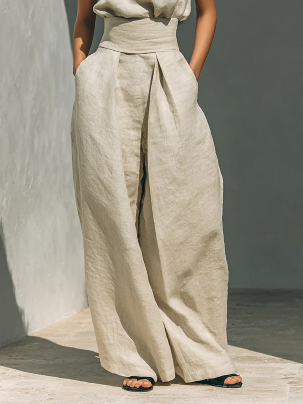 Shopimist sleeveless turtleneck top and matching pants set, shown in a stylish, coordinated outfit with a fitted silhouette.