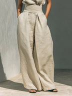Shopimist sleeveless turtleneck top and matching pants set, shown in a stylish, coordinated outfit with a fitted silhouette.