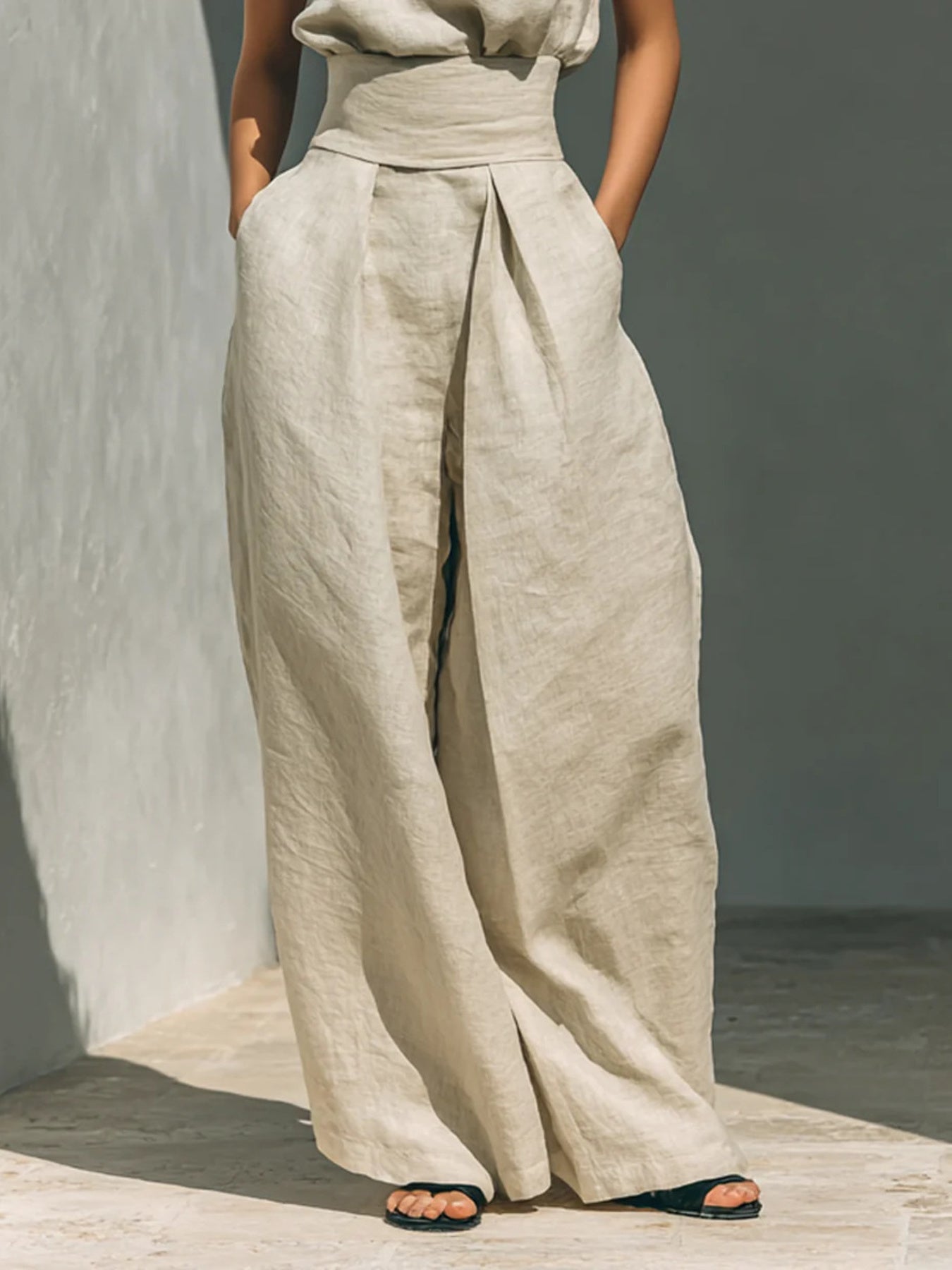 Shopimist sleeveless turtleneck top and matching pants set, shown in a stylish, coordinated outfit with a fitted silhouette.