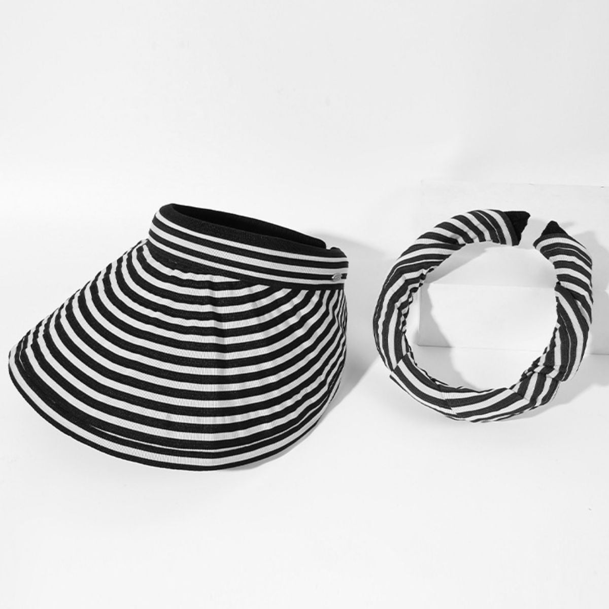 Women's striped wide brim sun visor hat by Trendsi, breathable summer beach accessory, offers stylish sun protection and ventilation.