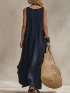 Plus size Shopimist maxi dress with scoop neck, sleeveless design, full length, and flowing silhouette.