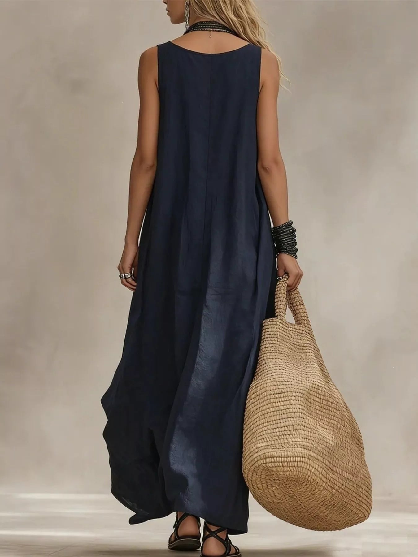 Plus size Shopimist maxi dress with scoop neck, sleeveless design, full length, and flowing silhouette.