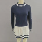 Women's long sleeve sweater dress by Plush Fashion Hub, casual wear with a soft knit fabric and fitted silhouette.