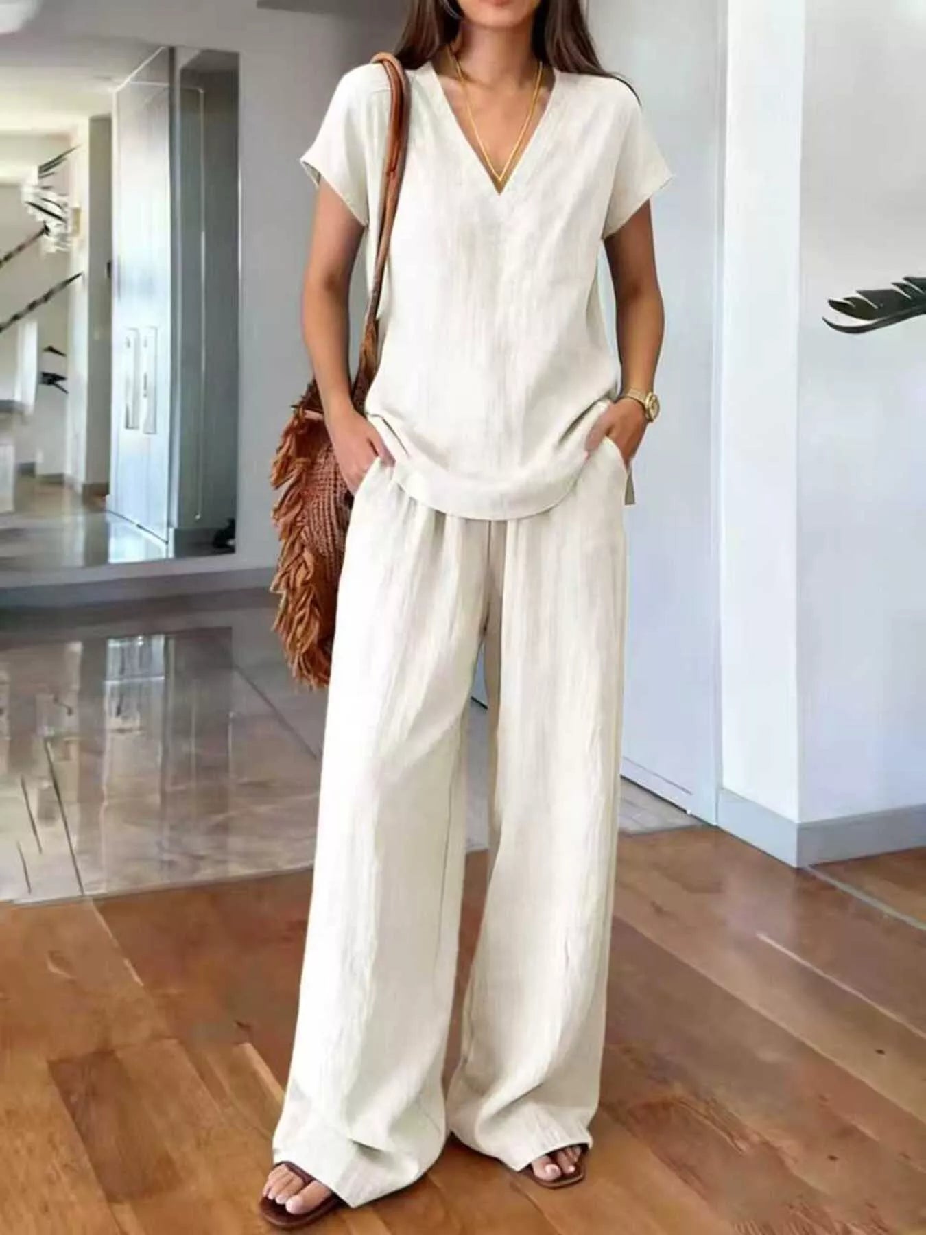 Plus size V-neck short sleeve lounge set with matching pants from Plush Fashion Hub, comfortable and stylish lounge wear.