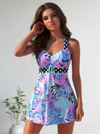 Women's high-neck tankini swimsuit with adjustable straps in plus size by FitiqueFit, featuring a supportive, stylish swimwear design.