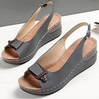 Women's comfortable peep toe wedge sandals with mid-heel, casual dress shoes featuring trendy designs and neutral color.