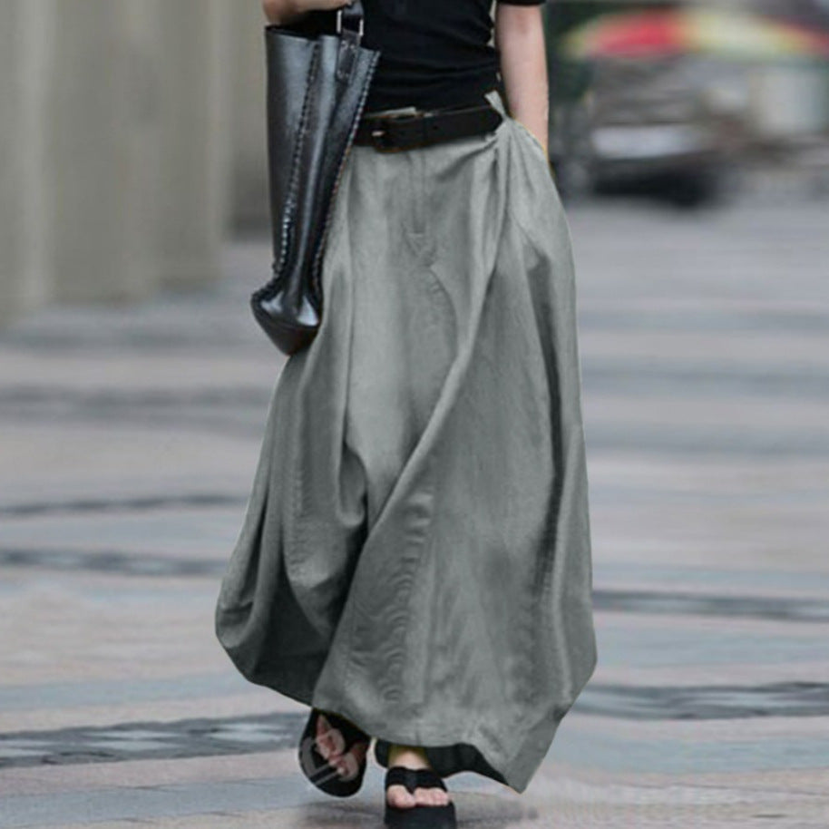 Women's high-waist flared maxi skirt in solid cotton linen with pockets, stylish and comfortable from Plush Fashion Hub.