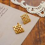 18K gold-plated geometric stud earrings with modern design, showcasing sleek lines and a polished finish.
