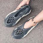 Trendsi hollow-out flat sandals featuring open toe design, slim straps, and stylish cut-out details for casual summer wear.