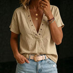 Women's loose-fit linen V-neck short-sleeve shirt from FitiqueFit, featuring lightweight, breathable fabric and a relaxed fit.