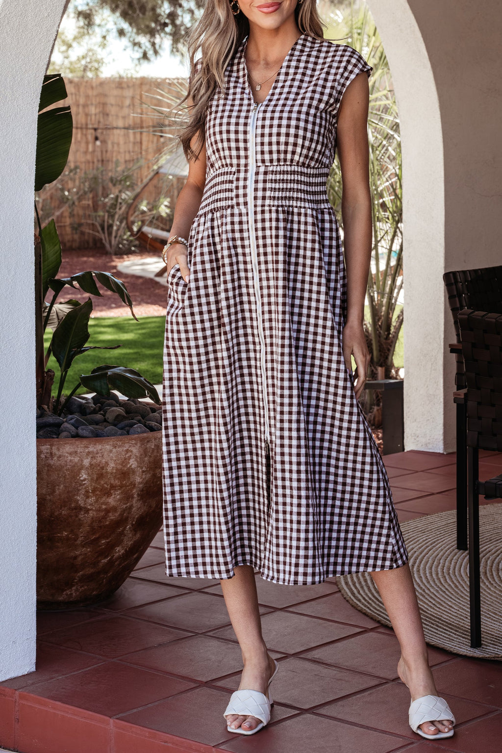 Threaded Pear Sarahi flare sleeveless maxi dress featuring a flowing silhouette and vibrant floral pattern.