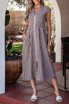 Threaded Pear Sarahi flare sleeveless maxi dress featuring a flowing silhouette and vibrant floral pattern.