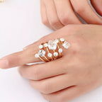 18K gold-plated multi-layered ring with intertwined bands, styled for elegant and modern jewelry looks.