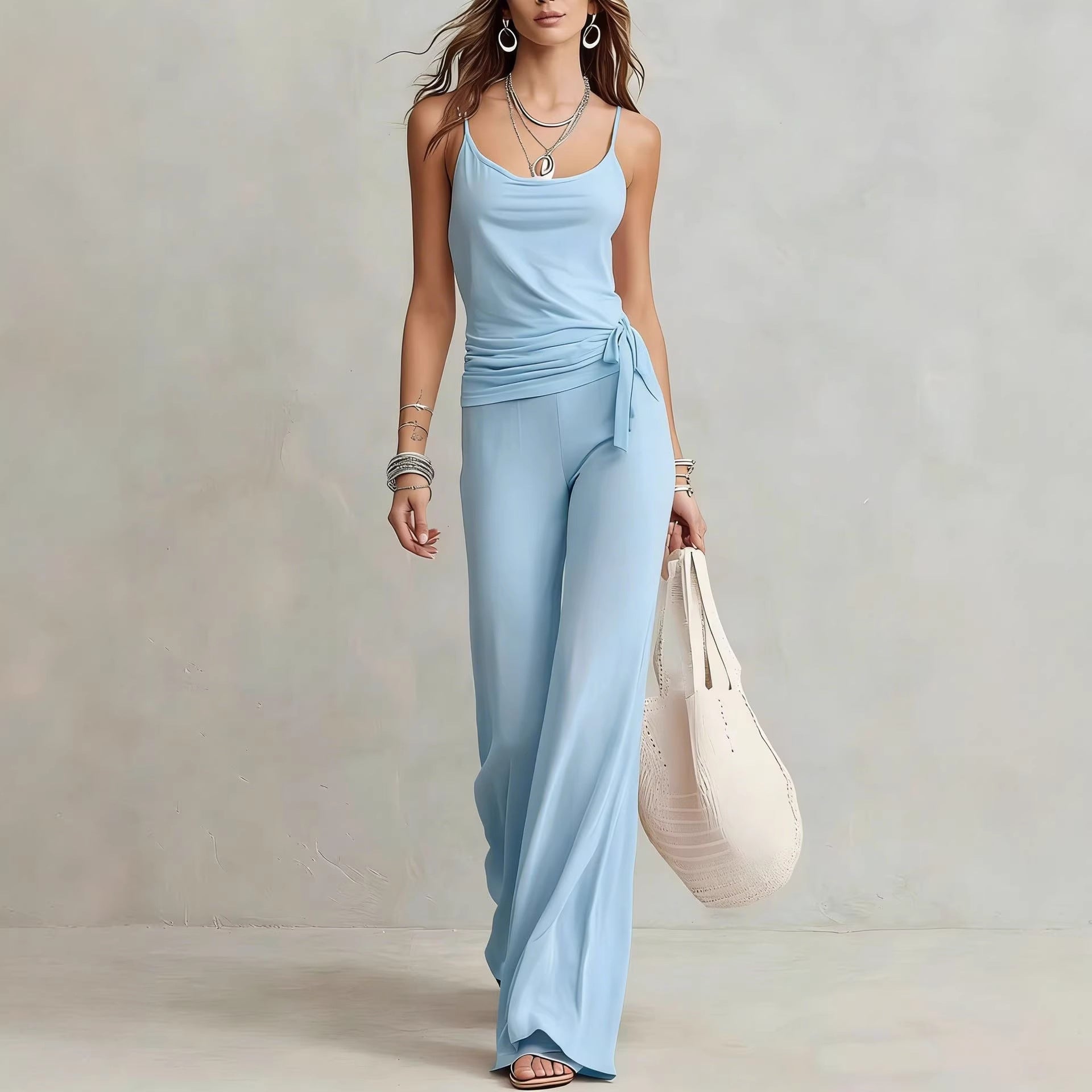 Women's solid color sleeveless top and pants two-piece casualwear set by FitiqueFit, featuring a relaxed fit and comfortable fabric.
