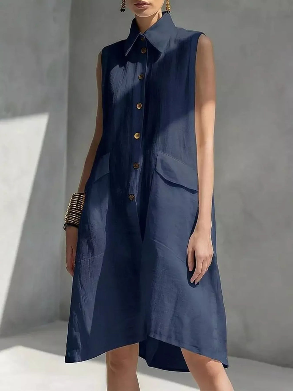 Plus size button front sleeveless dress by Shopimist, featuring a full-size fit and stylish design, shown on a model.