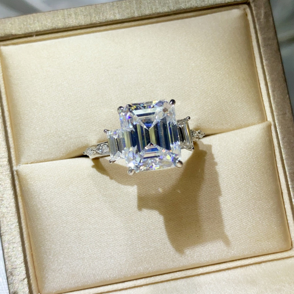 Sterling silver ring with a 5-carat moissanite gemstone, showcasing a sparkling, elegant design.