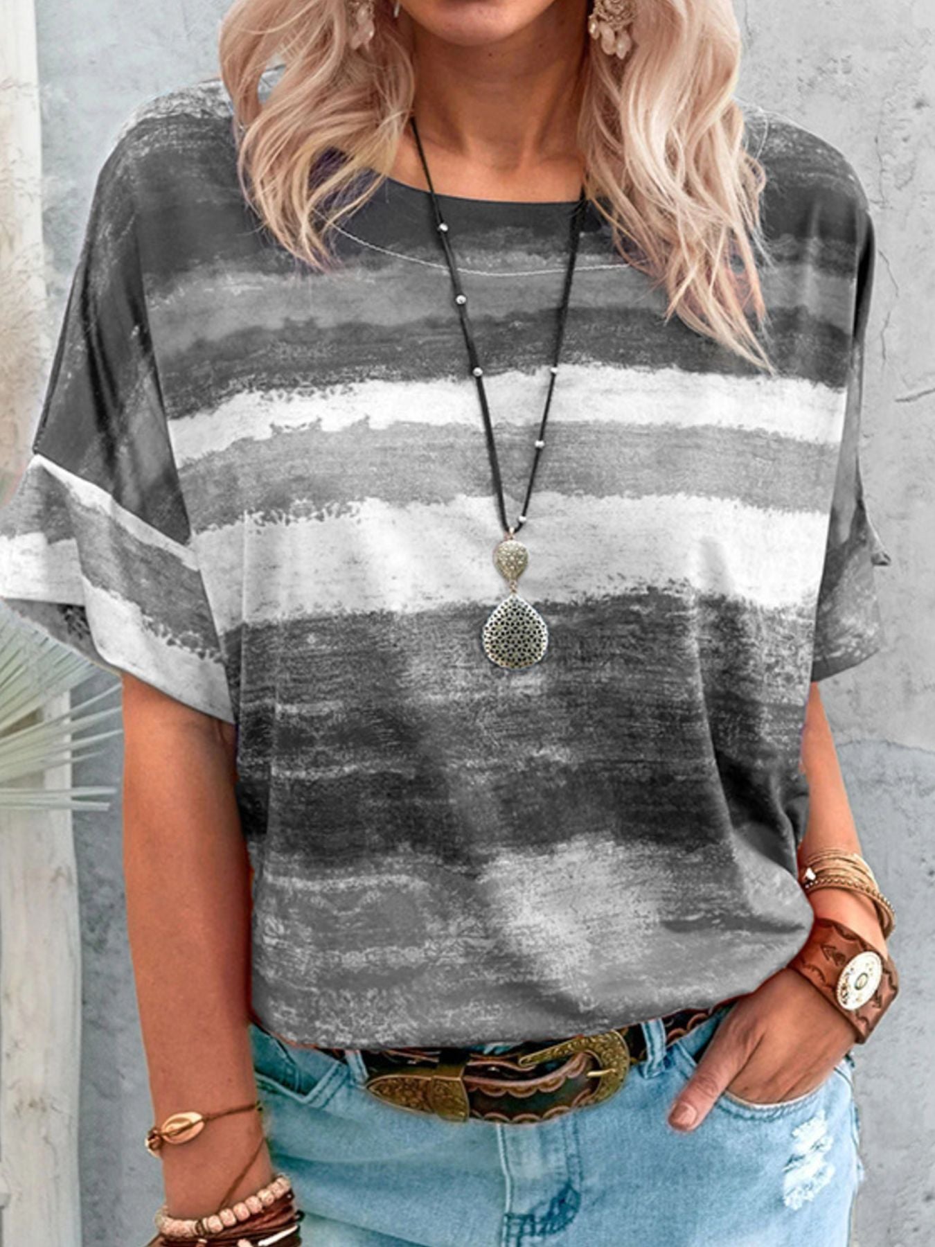 Women's casual short sleeve T-shirt with contrast round neck, from Trendsi, featuring a relaxed fit and classic style.