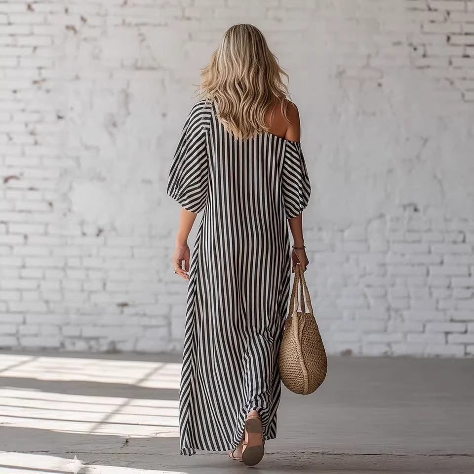 Women's striped off-shoulder dress by LadyShow.Store featuring a stylish design and comfortable fit, shown on a model.