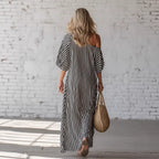 Women's striped off-shoulder dress by LadyShow.Store featuring a stylish design and comfortable fit, shown on a model.