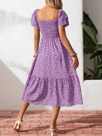Floral print smocked ruffle sleeve midi dress by Trendsi, lightweight summer dress with feminine ruffle details and a flowy silhouette.