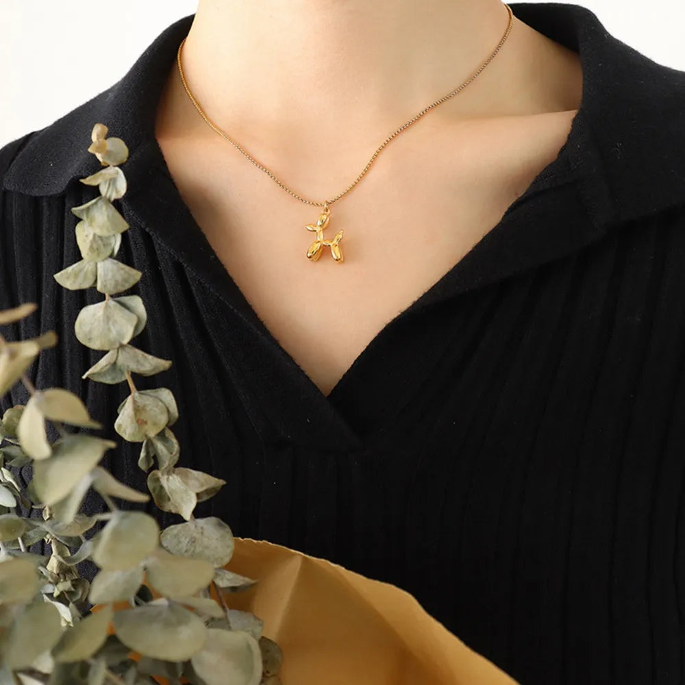 18K gold-plated titanium steel puppy pendant necklace with detailed dog charm, crafted for stylish pet lovers.