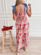 Floral print tie-shoulder midi dress with pockets, lightweight summer dress by Trendsi, featuring a feminine floral pattern and relaxed fit.