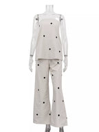 Polka dot tube top and pants set by Shopimist, featuring a stylish matching two-piece outfit with a polka dot pattern.