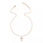 18K gold-plated rhinestone cross necklace with intricate design and sparkling stones, displayed on a neutral background.