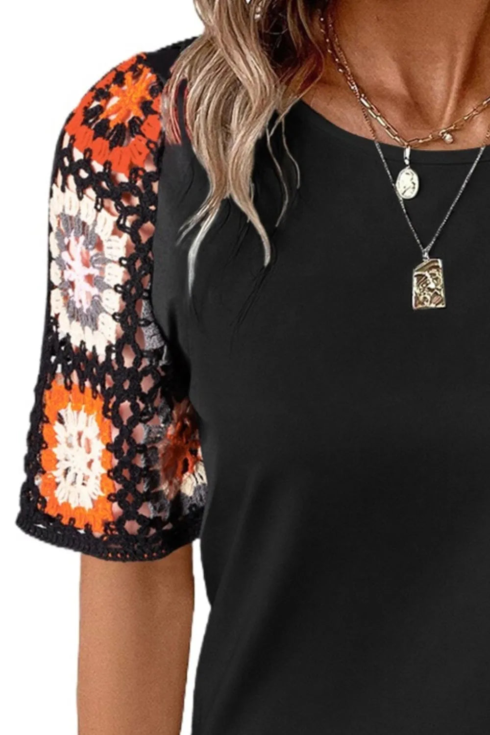 Geometric print round neck short sleeve blouse from Plush Fashion Hub, stylish tops with modern design and vibrant pattern.