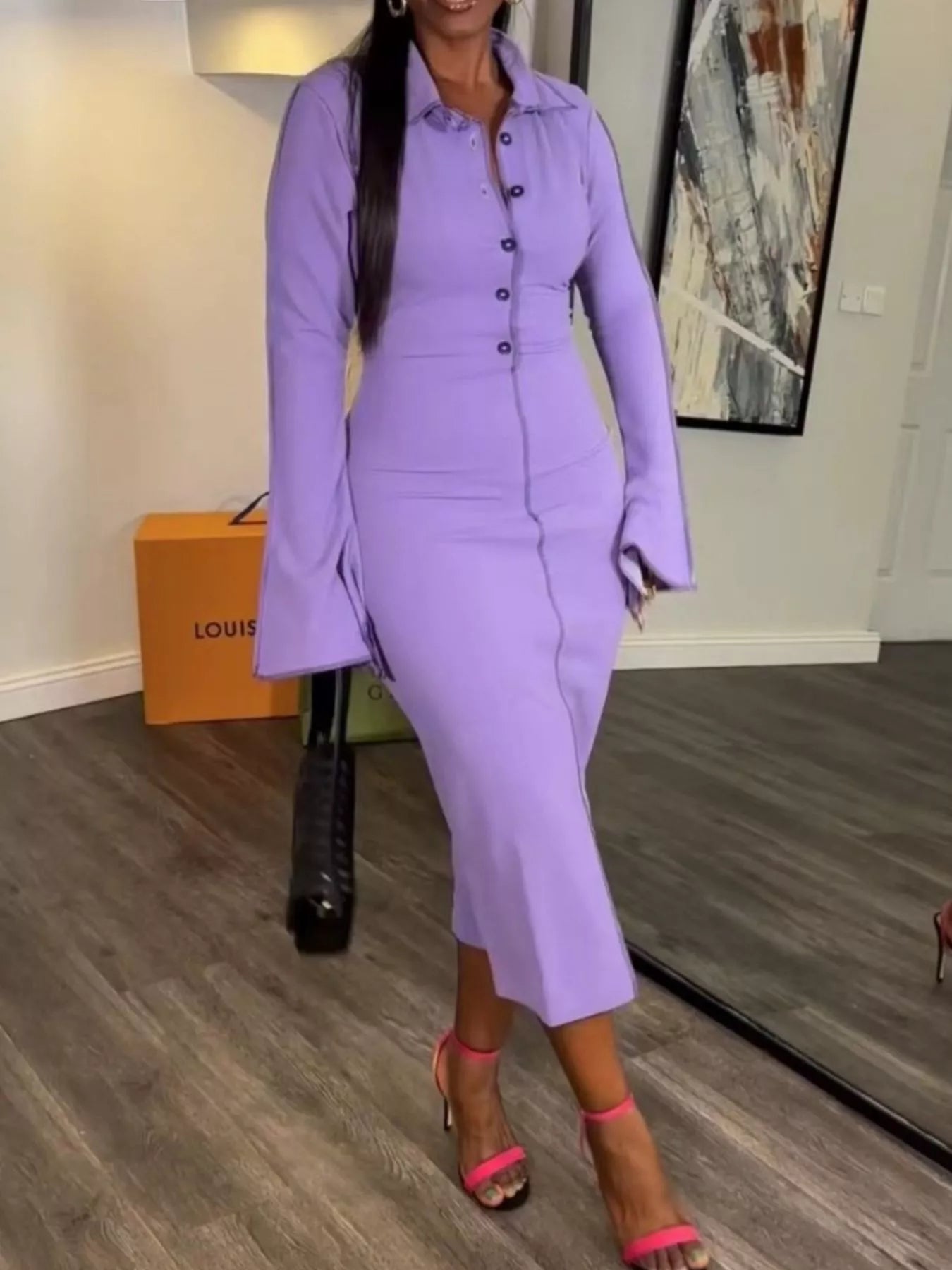 Long sleeve button front midi dress by Plush Fashion Hub featuring a sleek, stylish design and a flattering fit.