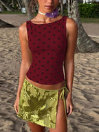 Polka dot tank top from Shopimist featuring a sleeveless design and classic black-and-white polka pattern.