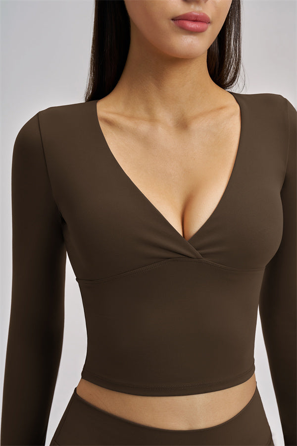 Fitglutes Activewear long sleeve crop top from The Swoon collection, featuring a fitted design and stylish athletic style.